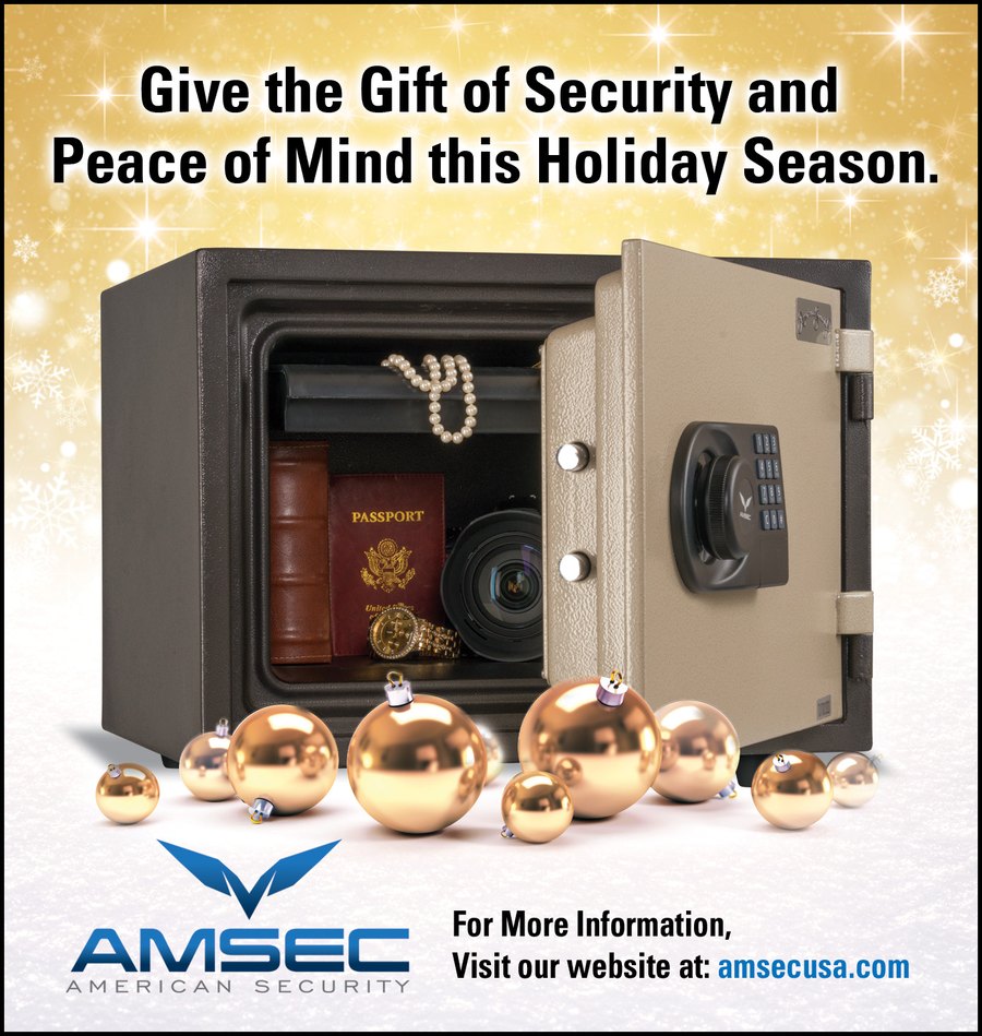 Holiday ad for AMSEC American Security showing an open fire safe holding a passport, pearls and a camera lens among gold ornaments, with the headline Give the Gift of Security and Peace of Mind this Holiday Season